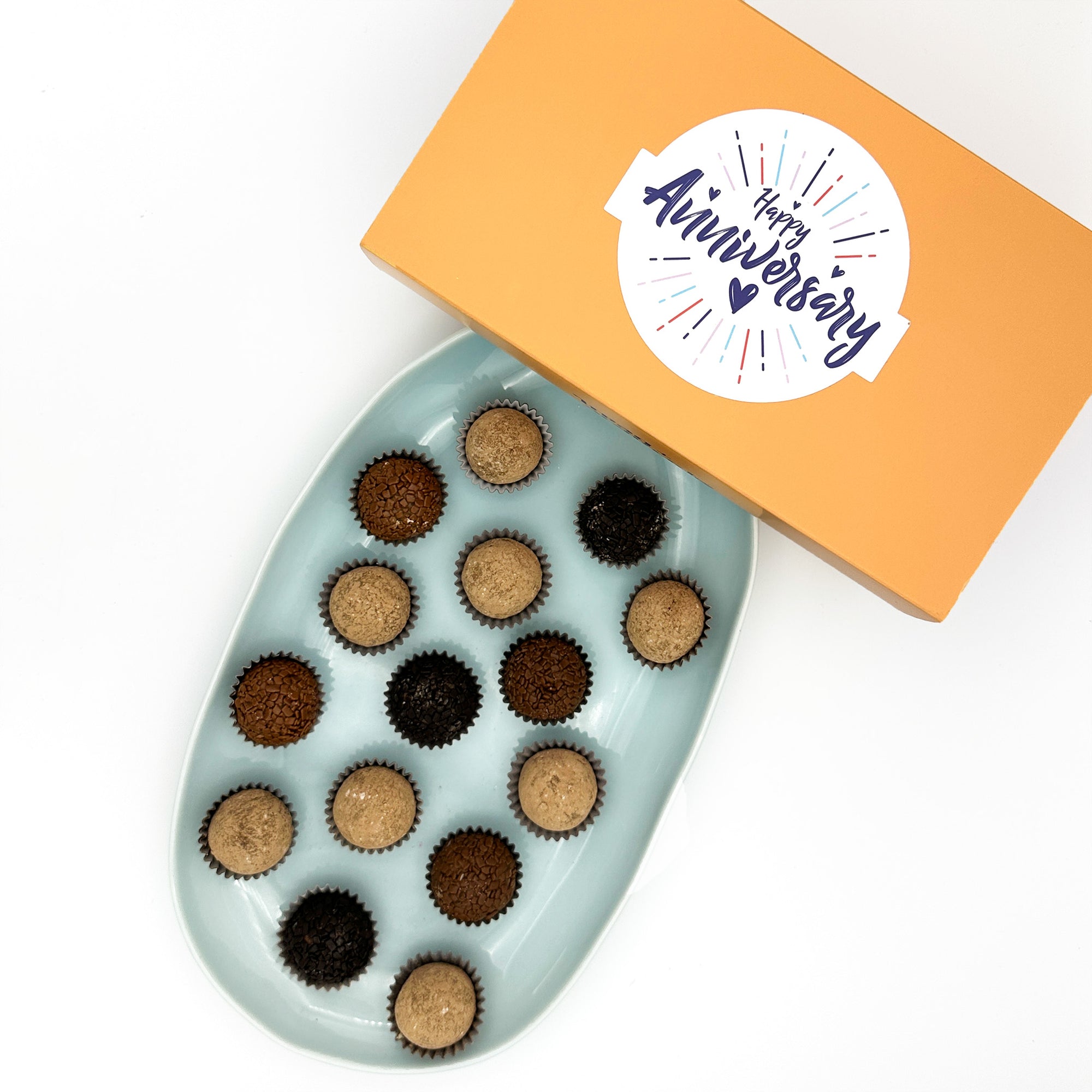 An exquisite box of Anniversary Coffee + Chocolate Brigadeiros, perfect for celebrating an anniversary.